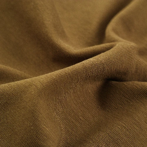 A close up of a brown canvas fabric suitable for a skirt