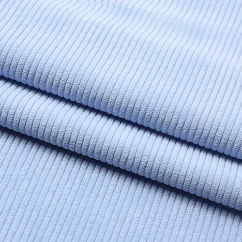 A close up of blue corduroy fabric suitable for pants