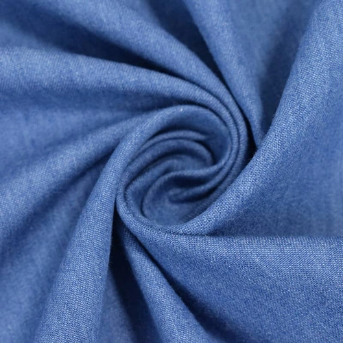 A close up of light blue denim fabric suitable for pants