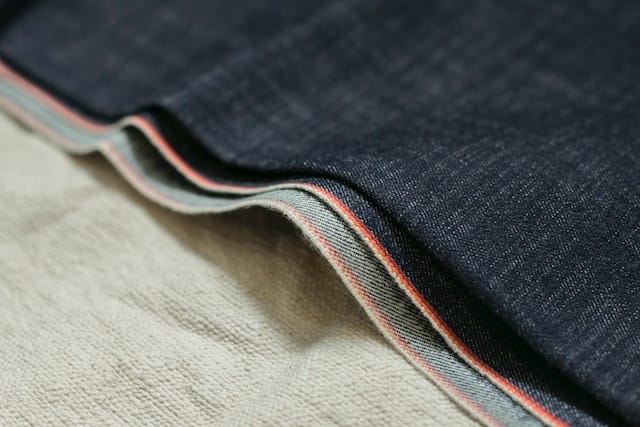 A close up of a pair of denim fabric