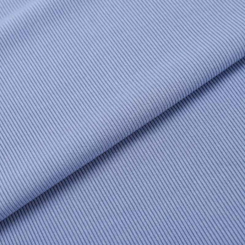 A close up of a blue jersey fabric perfect for skirts