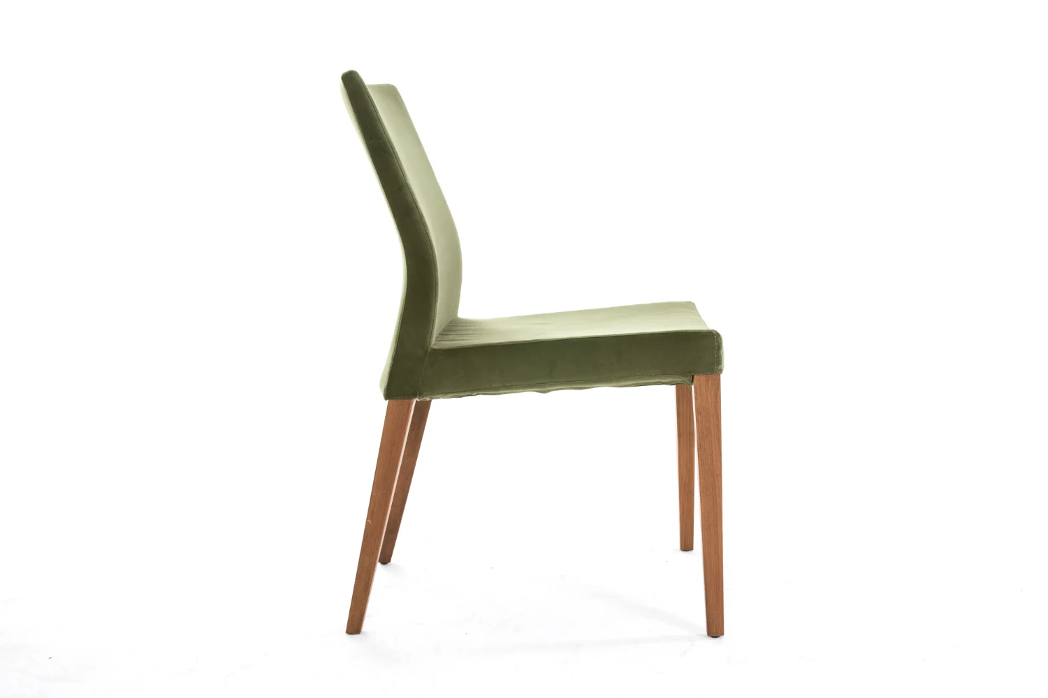 A green dining chair with wooden legs.