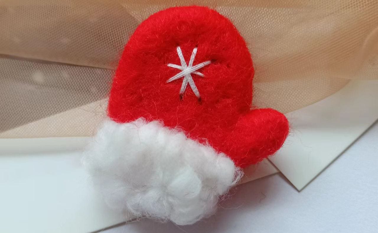 A red and white felt Mitten-Ornament