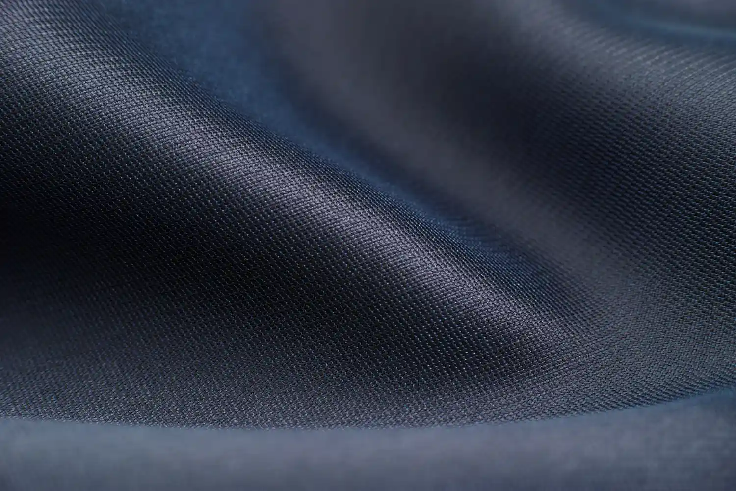 A close up image of a dark Nylon fabric