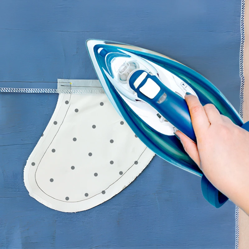 Use an iron to press the side seams of the inseam pocket.