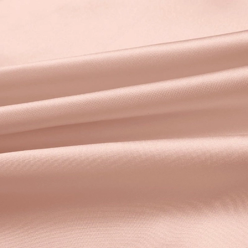 A close up of pink silk fabric suitable for pants