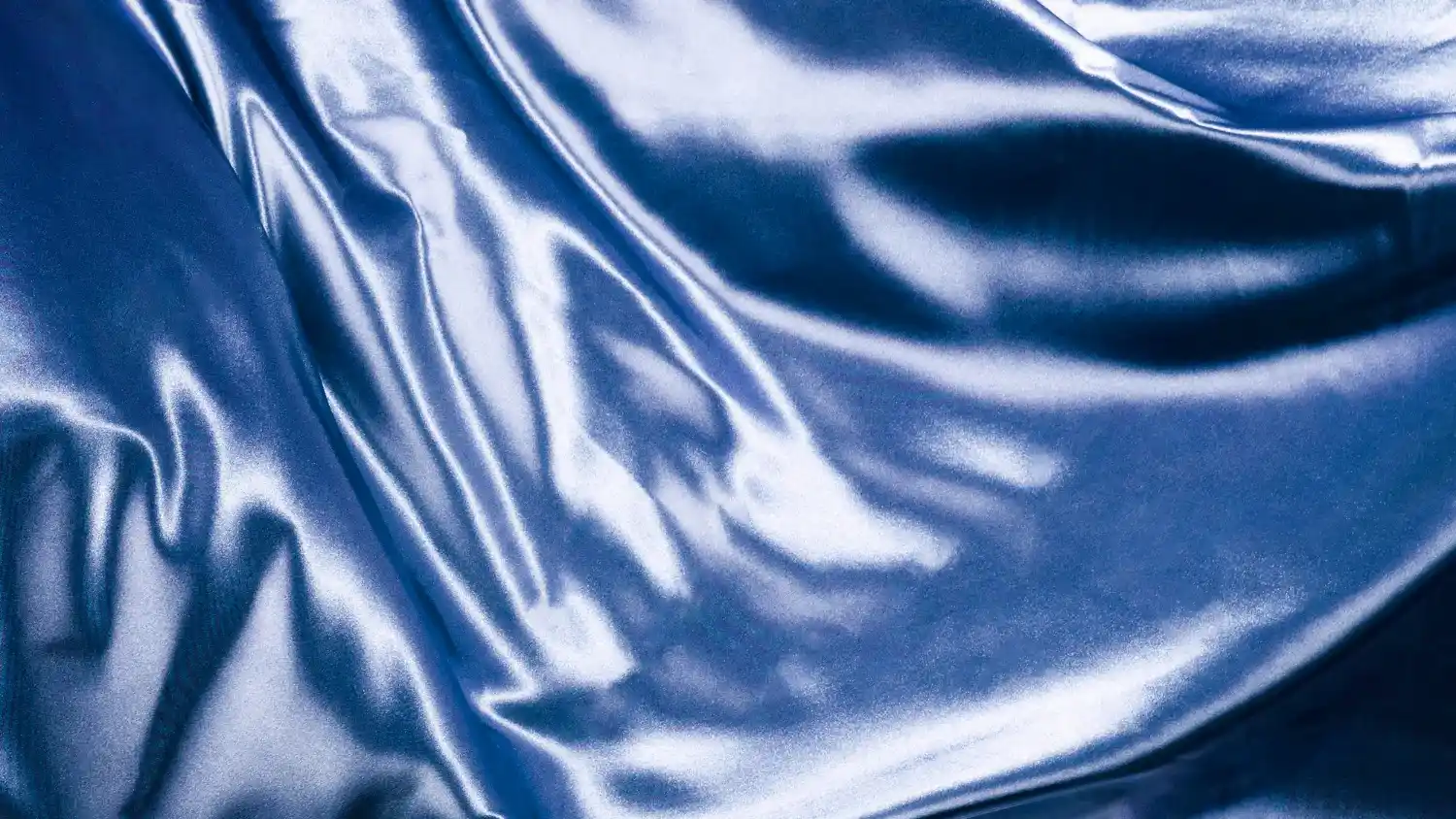 A close up of a blue Vinyl fabric.