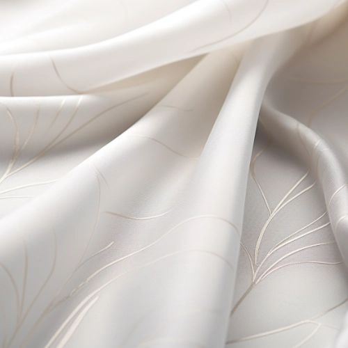 A close up of a white viscose fabric, similar to silk.