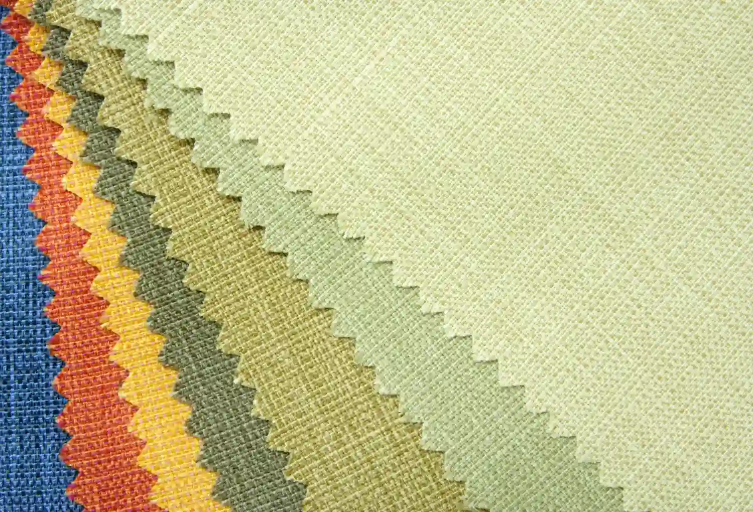 A close up of different colors of olefin fabric