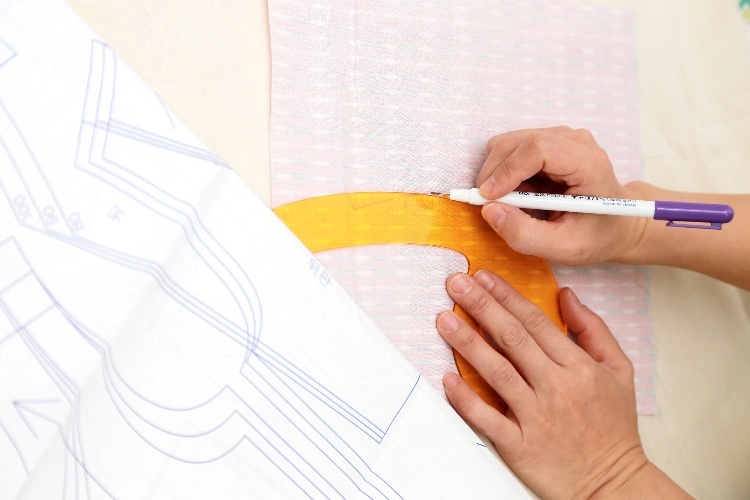 Transfer pattern markings, one of the 8 steps on how to use a sewing pattern.